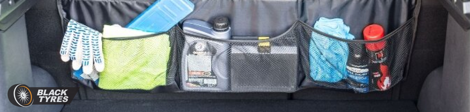 В сетку-растяжку для багажника можно сложить автокосметику, инструменты, щетки